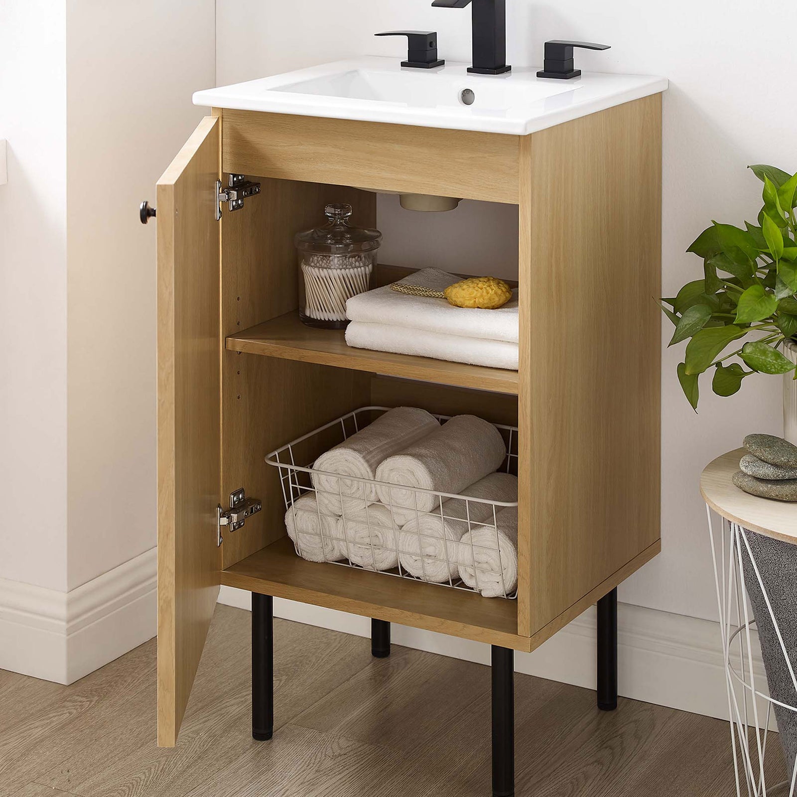 Adjustable shelf and roomy interior keep towels and toiletries tidy behind the door || EEI-6691-OAK-WHI || storage_open_room