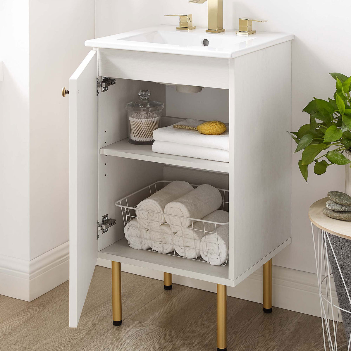Door opens to reveal adjustable shelf storage for towels and essentials || EEI-6691-WHI-WHI || front_angle_open_room