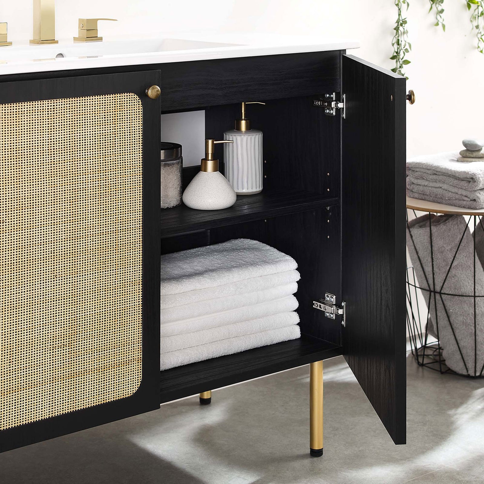 Cabinet interior with adjustable shelf keeps linens and bottles handy || EEI-6697-BLK-WHI || storage_open_room