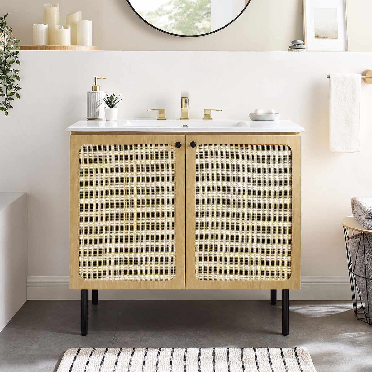 Airy, coastal-inspired vanity anchors the bathroom with rattan doors and white ceramic sink || EEI-6697-OAK-WHI || front_room