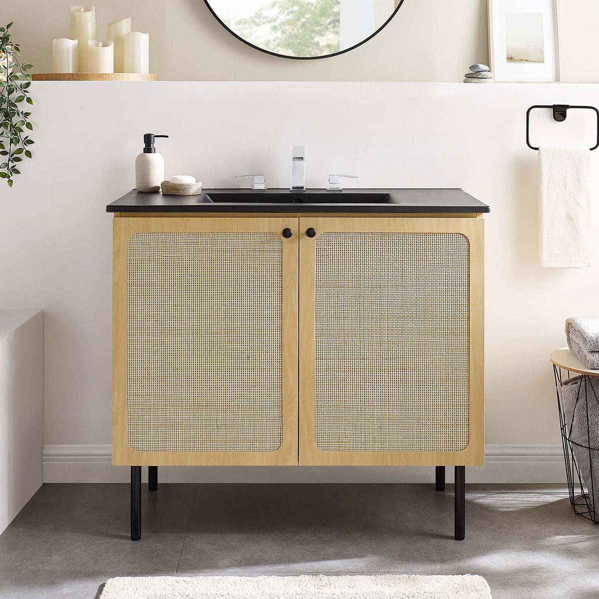 Modern 36-inch vanity anchors a bright, welcoming bathroom scene. || EEI-6698-OAK-BLK || front_room