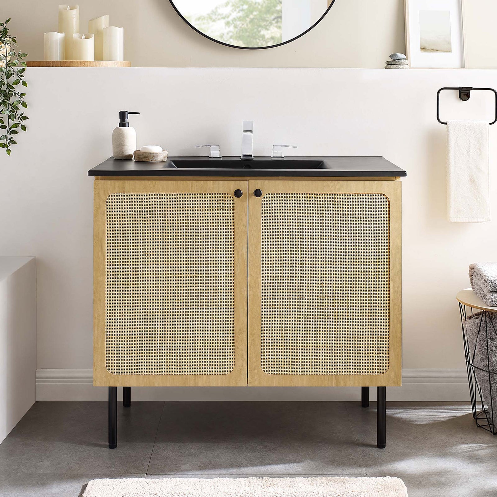 Modern 36-inch vanity anchors a bright, welcoming bathroom scene. || EEI-6698-OAK-BLK || front_room