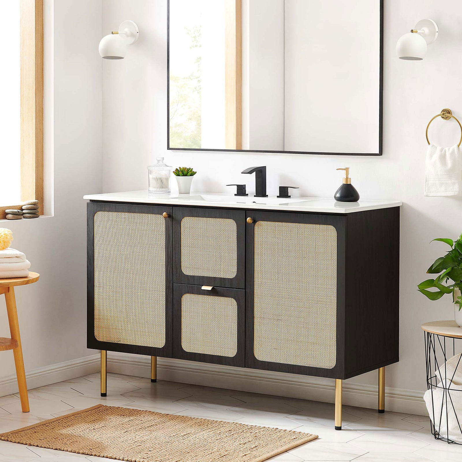 Modern vanity anchors a bright bath with natural cane accents and a crisp white top || EEI-6699-BLK-WHI || front_room