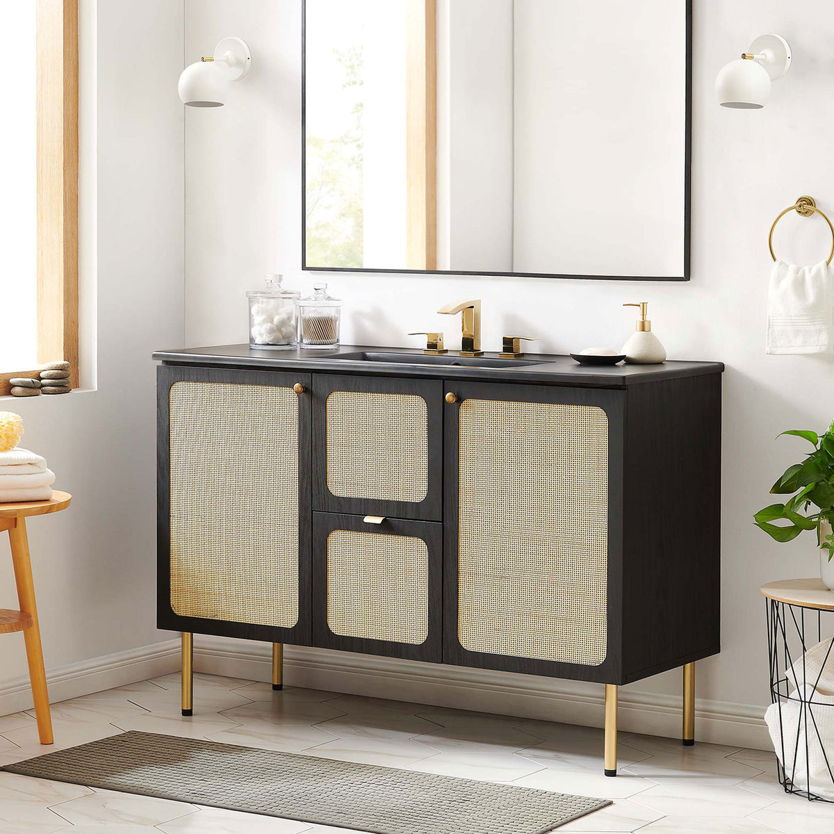 Chic black vanity with cane-front doors brings warm texture to a light, airy bath. || EEI-6700-BLK-BLK || front_room