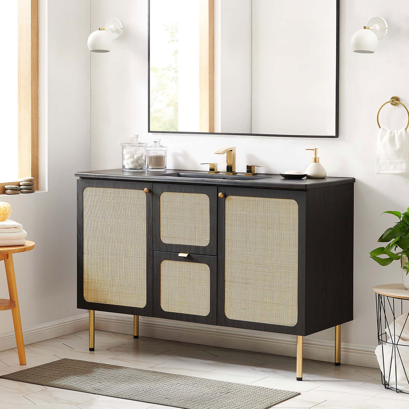 Chic black vanity with cane-front doors brings warm texture to a light, airy bath. || EEI-6700-BLK-BLK || front_room