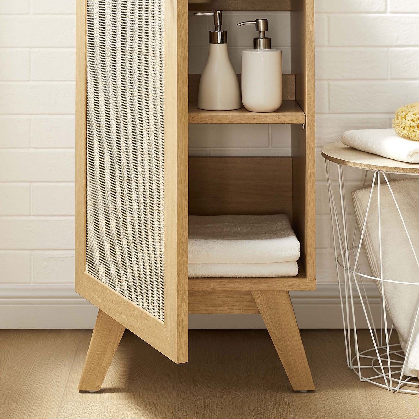 Adjustable shelf keeps towels tidy behind the cane door || EEI-6712-OAK-BLK || storage_open_room