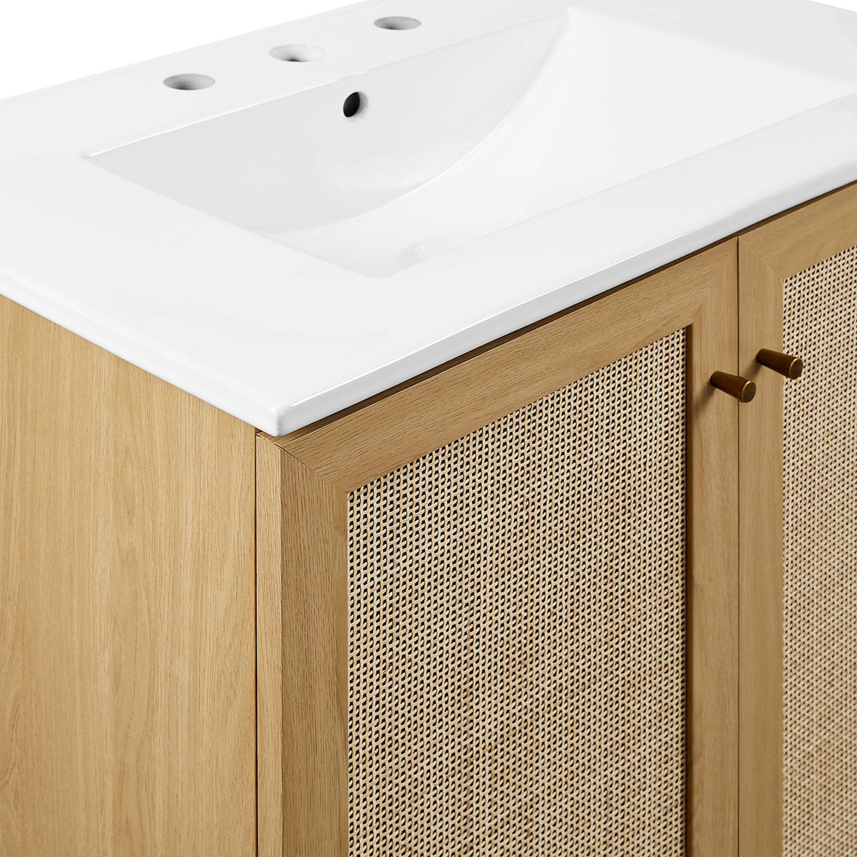 Brushed gold knobs and woven cane panels add refined, organic texture. || EEI-6715-OAK-WHI || detail_studio