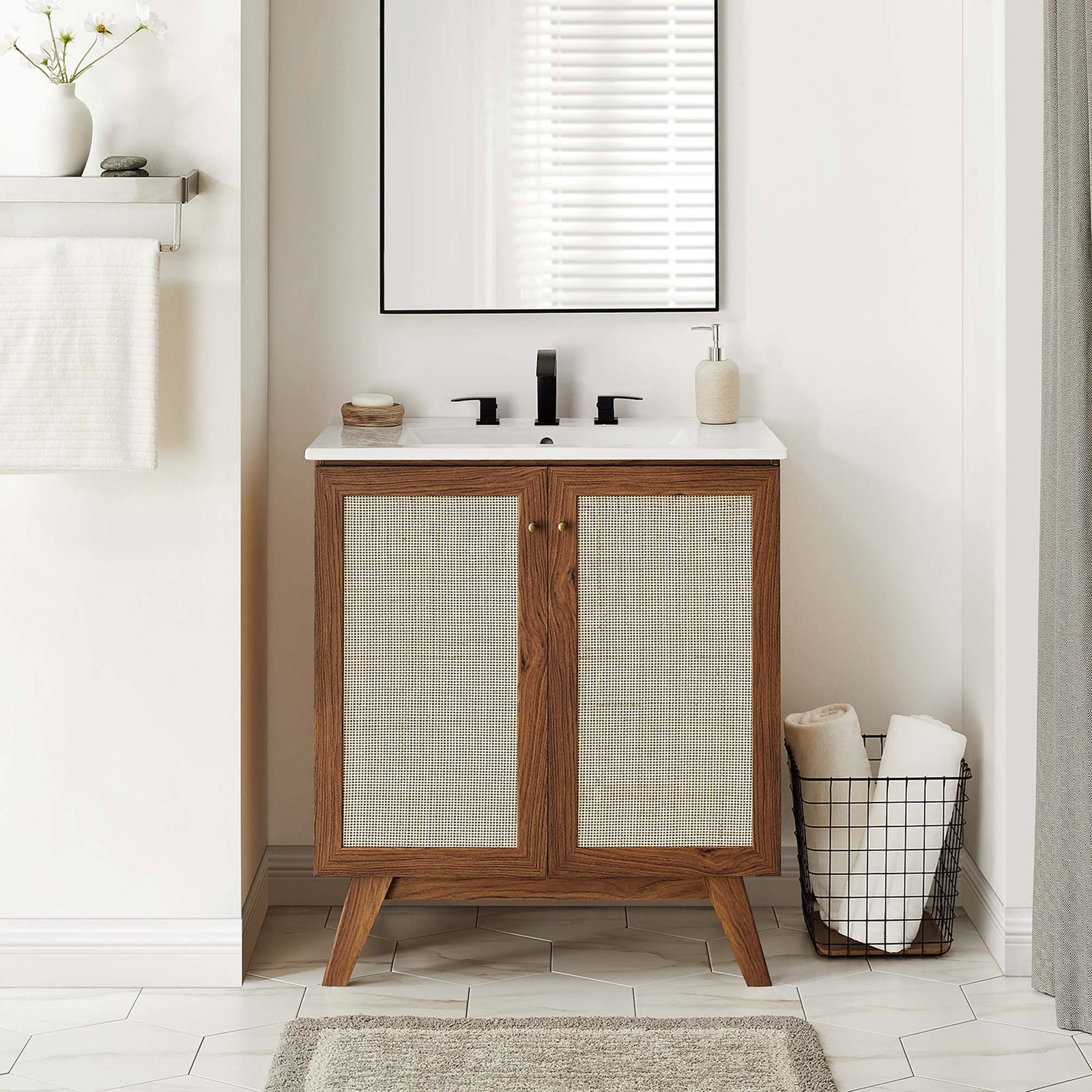 Elevates the bath with warm walnut grain, woven doors, and a bright, modern sink || EEI-6715-WAL-WHI || front_room