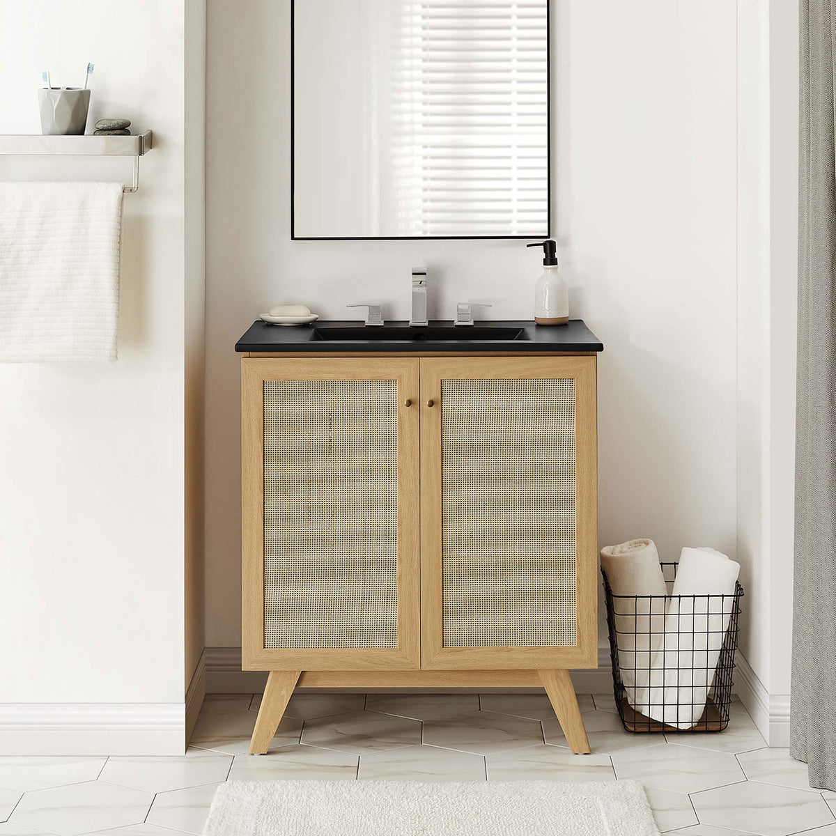 Crisp matte black sink and breezy rattan doors bring natural warmth to a clean bathroom setup || EEI-6716-OAK-BLK || front_room