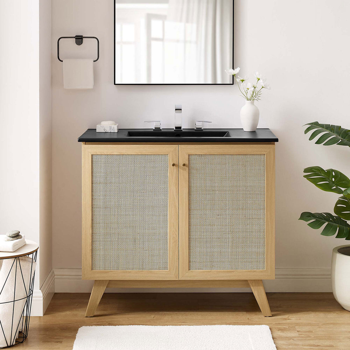 Effortless bathroom update with warm oak, rattan doors, and a crisp black sink || EEI-6718-OAK-BLK || front_room