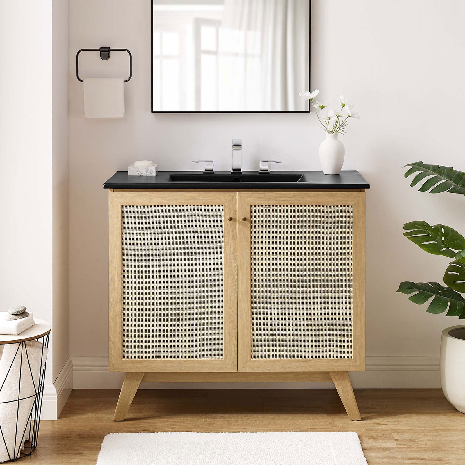 Effortless bathroom update with warm oak, rattan doors, and a crisp black sink || EEI-6718-OAK-BLK || front_room