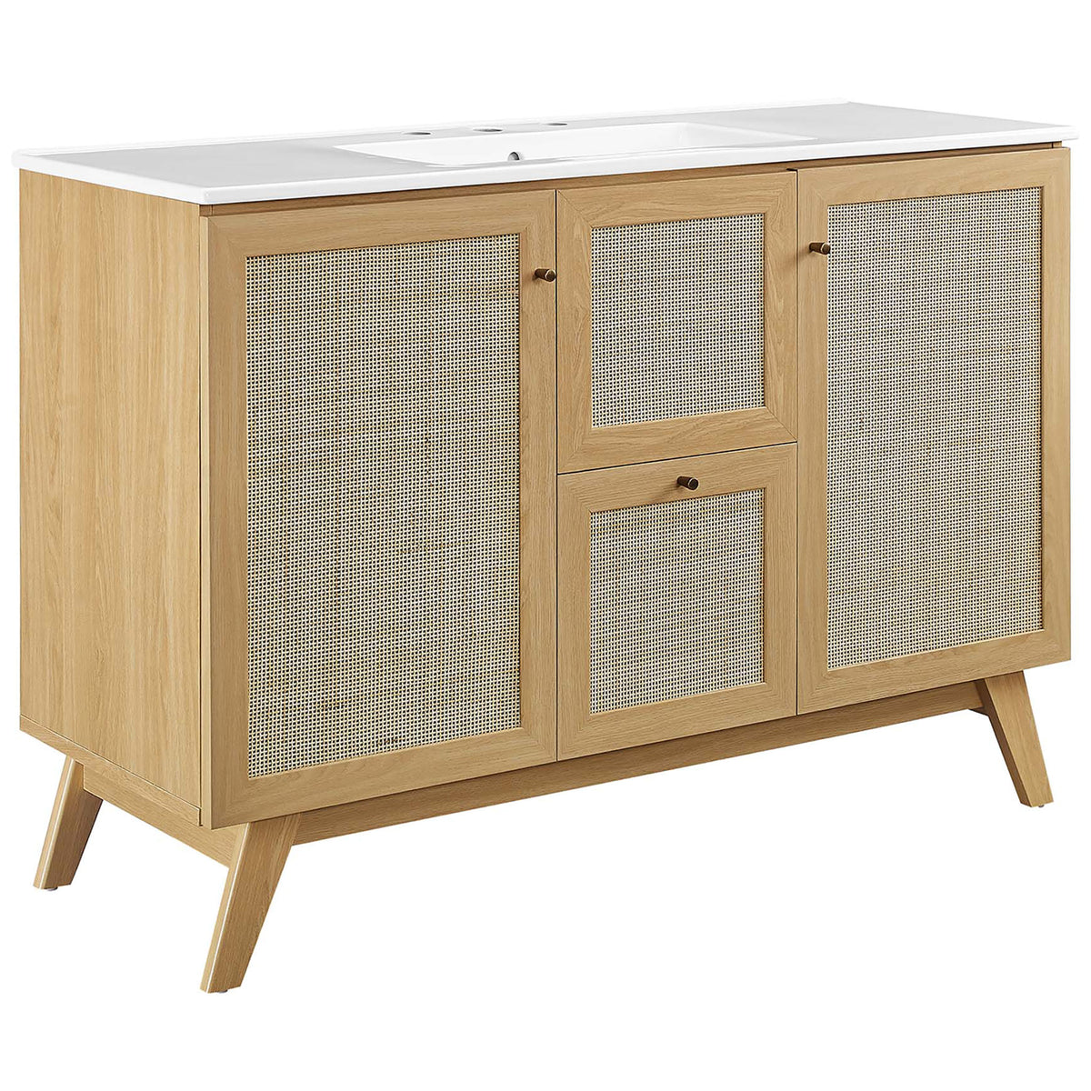 Warm oak vanity with rattan doors, brushed gold knobs, and a white ceramic sink || EEI-6719-OAK-WHI || front_angle_studio