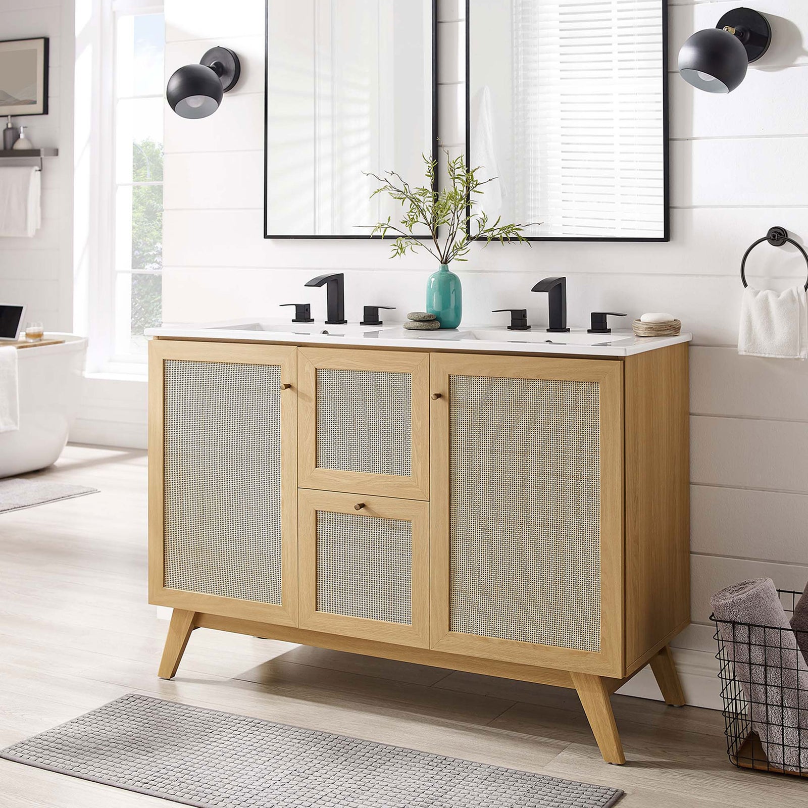 Warm oak vanity with rattan fronts and double sinks enhances a bright bath || EEI-6721-OAK-WHI || front_angle_room