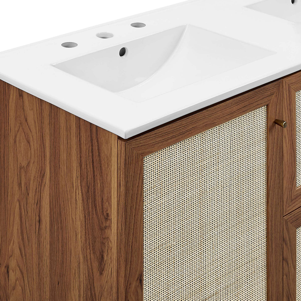 Brushed gold knob and woven rattan door detail against a smooth white countertop || EEI-6721-WAL-WHI || detail_studio