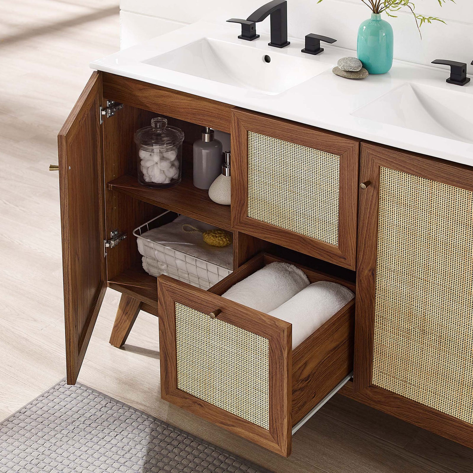 Open cabinets and drawer reveal organized storage beneath the sleek double-basin top || EEI-6721-WAL-WHI || front_angle_open_room
