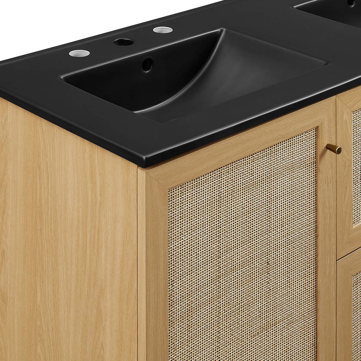 Close-up of the matte black basin and woven cane door framed in warm oak || EEI-6722-OAK-BLK || detail_studio