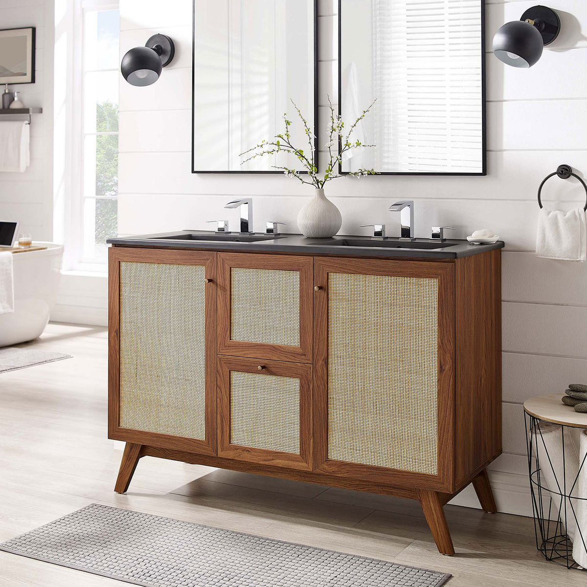 Warm walnut finish and airy cane doors elevate a bright, spa-like bath || EEI-6722-WAL-BLK || front_room