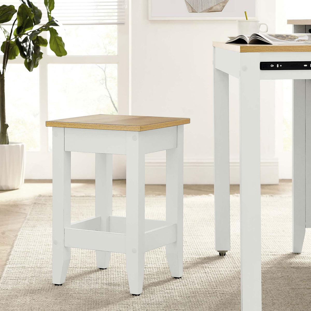 Versatile counter stool that pairs seamlessly with islands, adding natural wood warmth and fresh white contrast || EEI-6729-OAK-WHI || front_angle_room