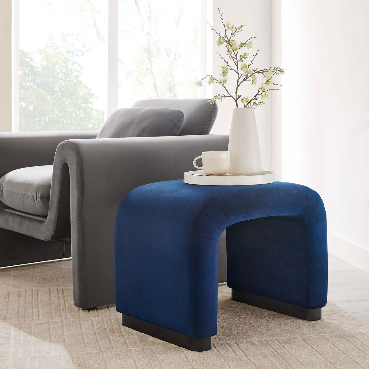 Stool doubles as a sleek side table, pairing luxe velvet with a sturdy base || EEI-6733-BLK-MID || front_angle_room