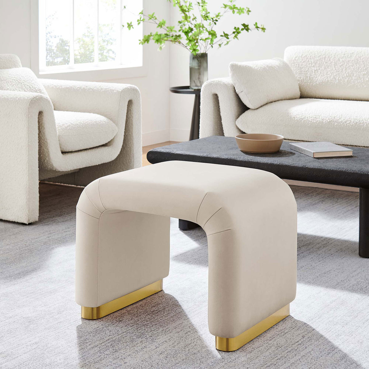Versatile waterfall stool doubles as extra seating or a chic side table with brass accents || EEI-6733-BRA-ALM || front_angle_room