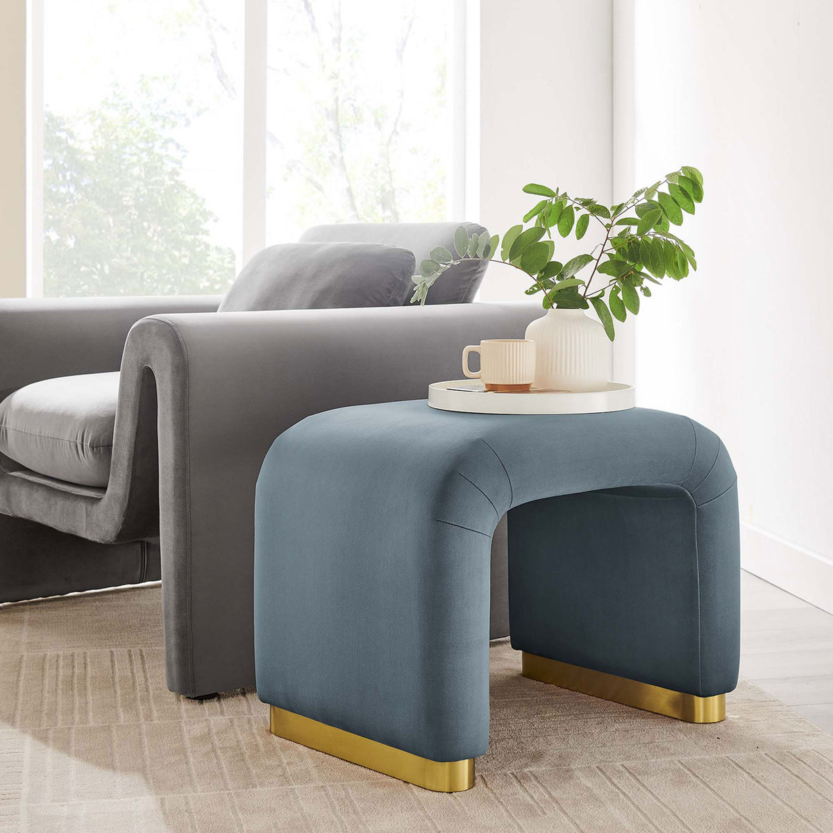 Doubles as a stylish side table, elevating everyday essentials with luxe velvet and brass || EEI-6733-BRA-CAB || front_angle_room