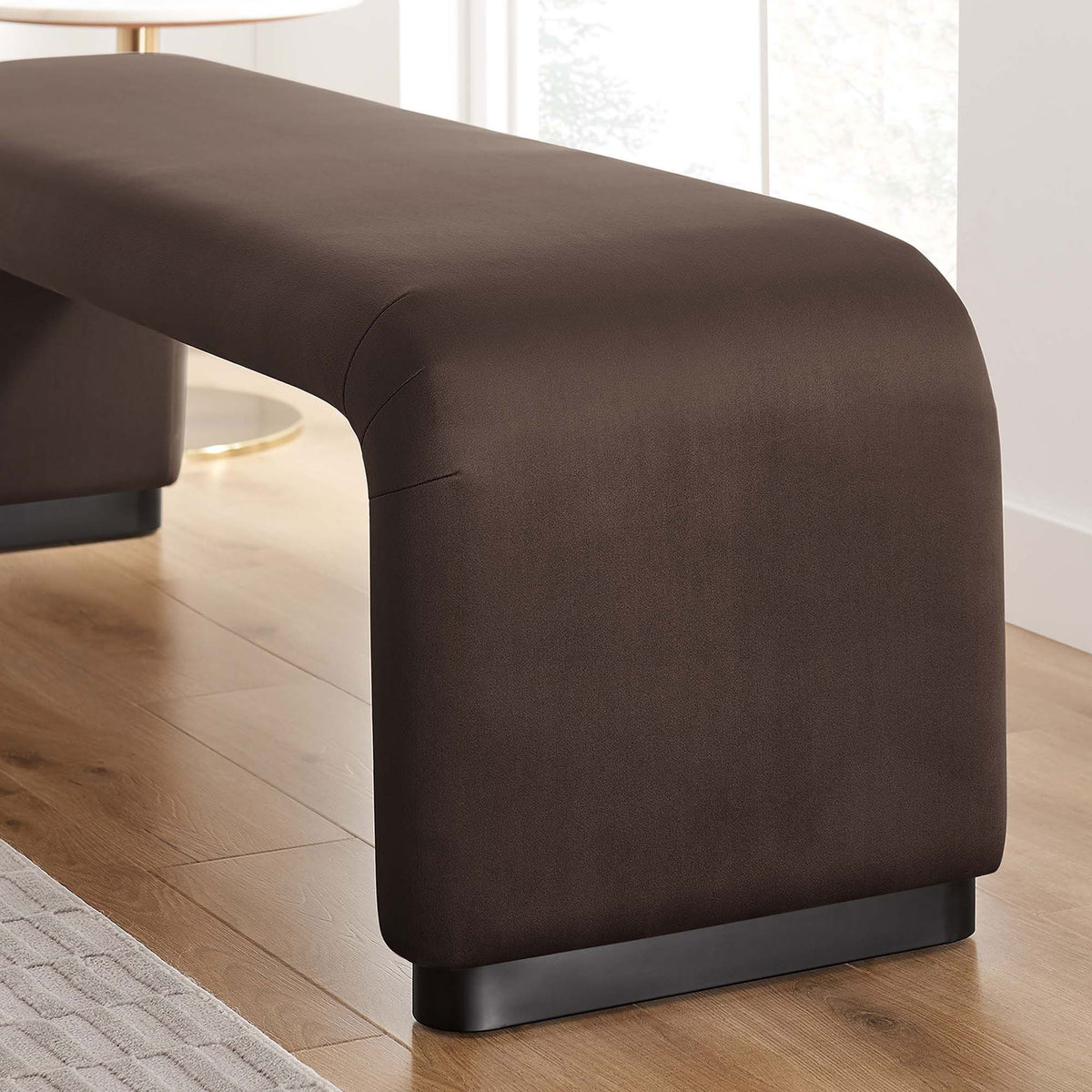 Soft waterfall leg and low-profile base complement warm, modern decor. || EEI-6734-BLK-CHB || detail_room