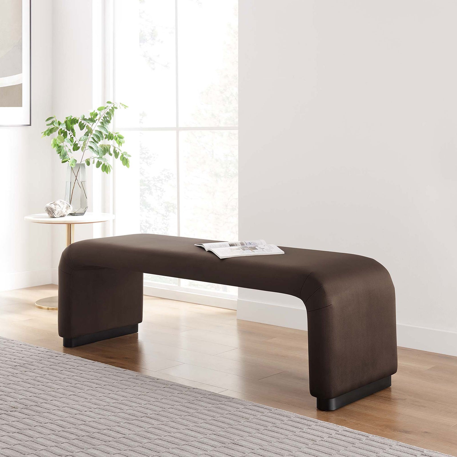 Elevates living spaces with soft curves, chocolate velvet, and a clean, contemporary presence. || EEI-6734-BLK-CHB || front_angle_room