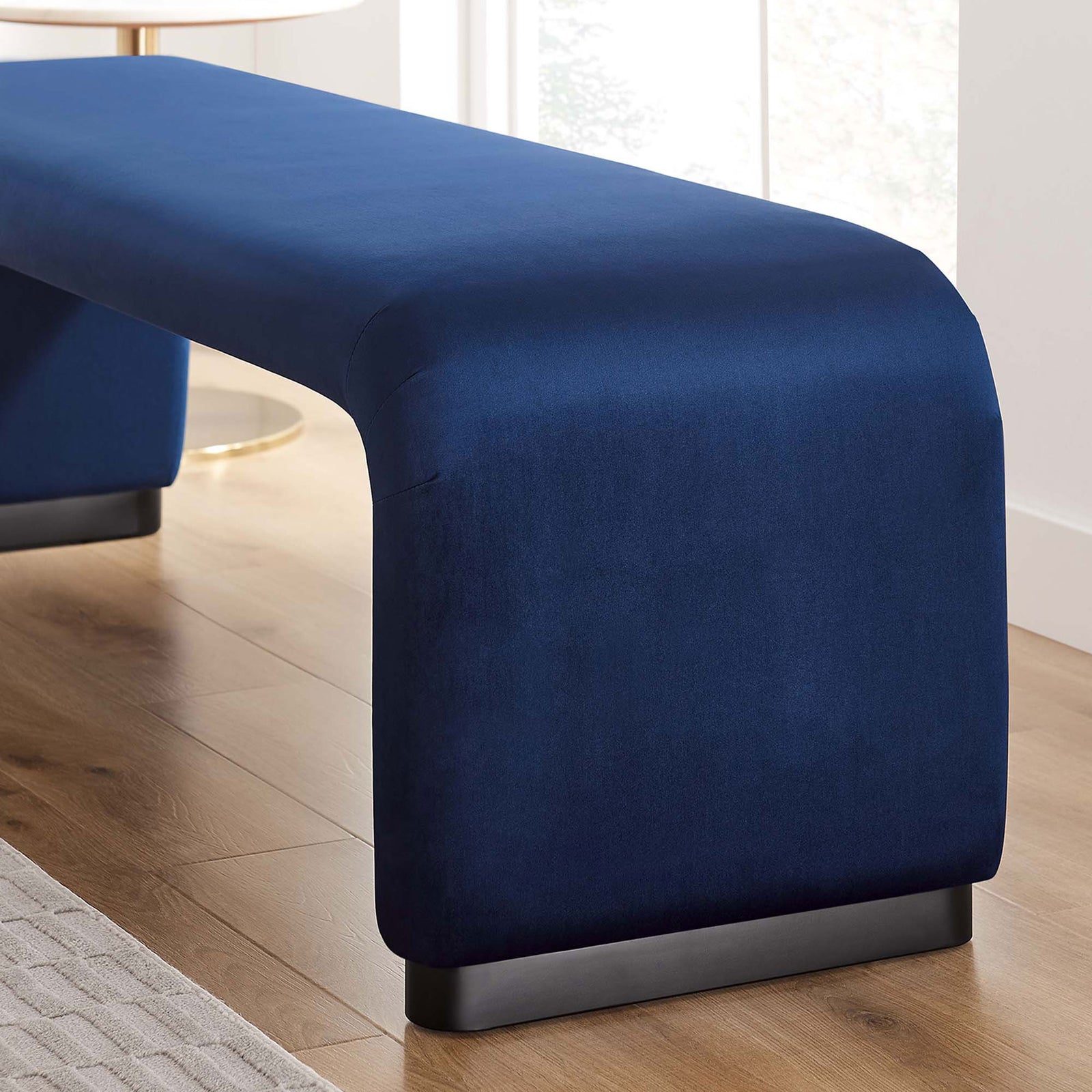 Rich midnight blue velvet adds a modern accent against warm wood floors and natural light || EEI-6734-BLK-MID || detail_room