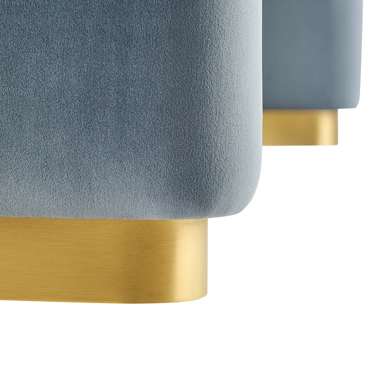 Brushed brass base details add a sleek contrast beneath the smooth cadet blue performance velvet upholstery. || EEI-6735-BRA-CAB || leg_studio
