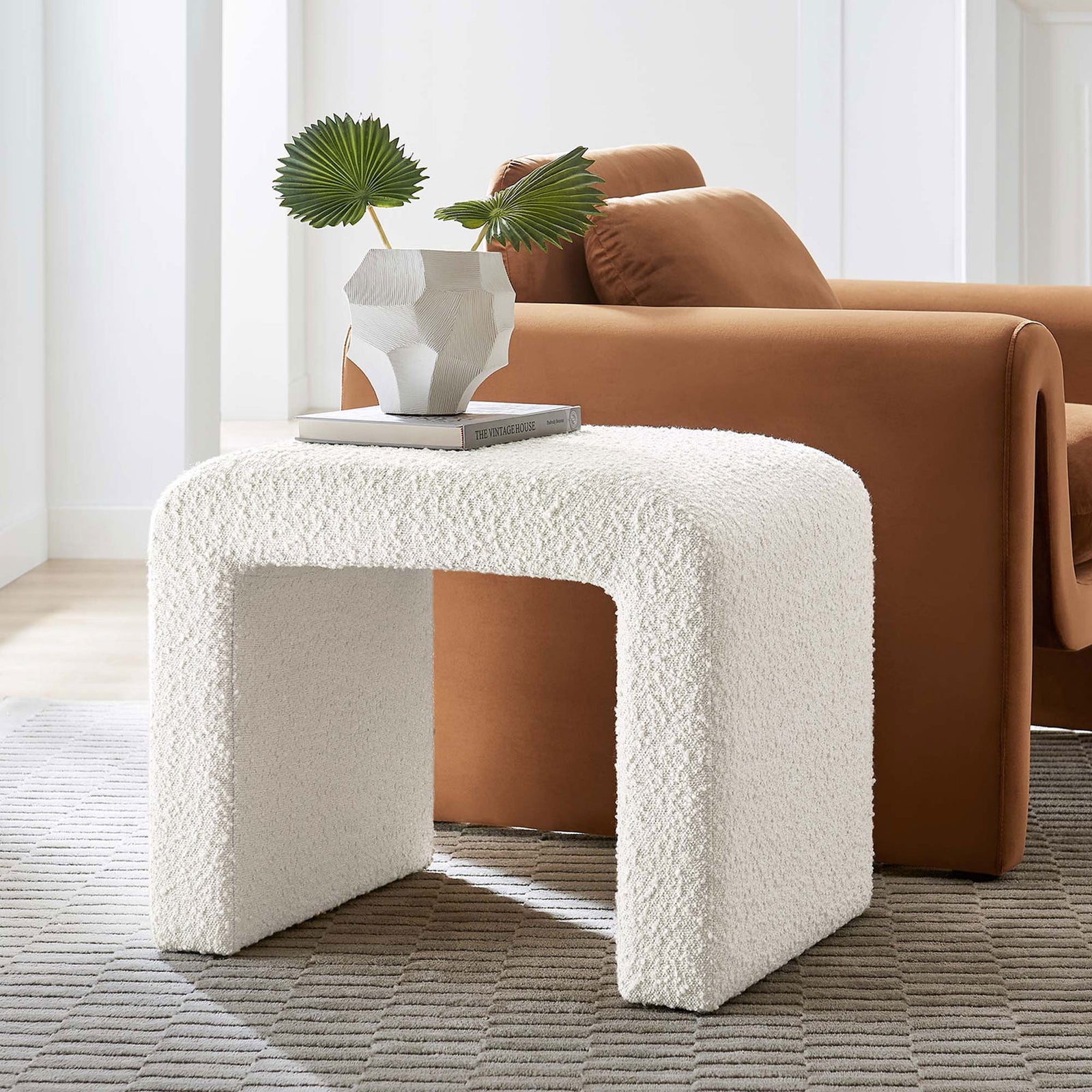 Ivory boucle waterfall stool adds soft texture and sculptural form to modern living spaces || EEI-6737-IVO || front_angle_room