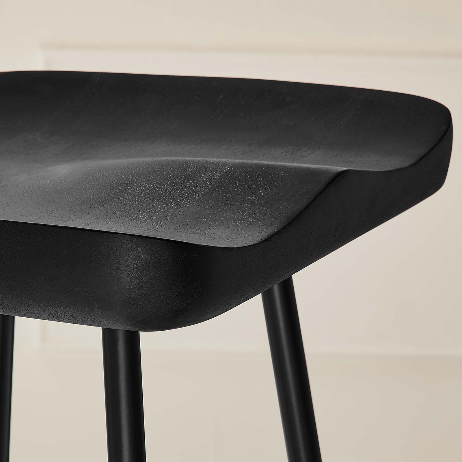 Sculpted black wood seat adds refined texture to a clean, modern space || EEI-6742-BLK || detail_room