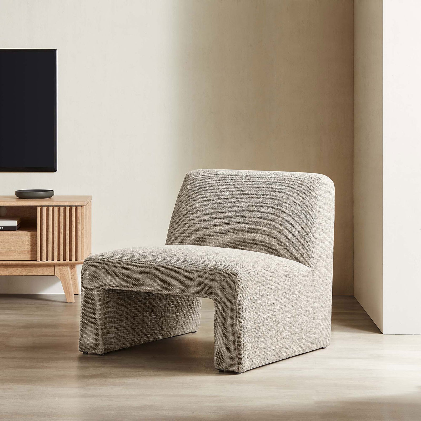 Modern armless chair in khaki chenille brings plush, versatile seating to the room || EEI-6765-KHA || front_angle_room