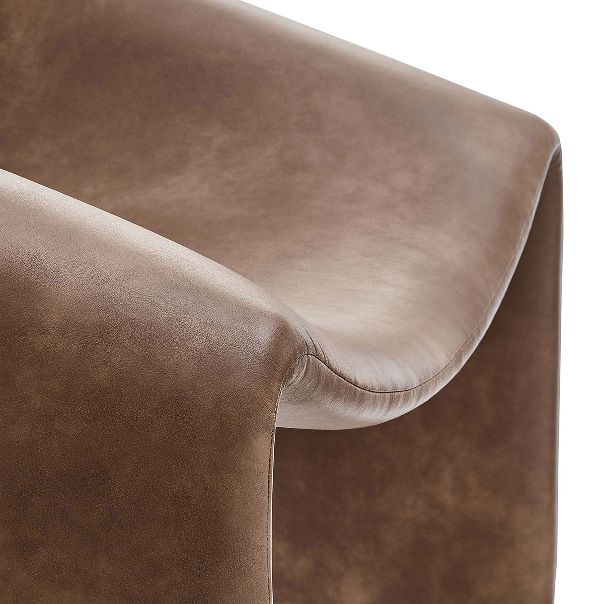 Smooth curvature and neatly finished seams on the brown vegan leather upholstery || EEI-6768-BRN || detail_studio