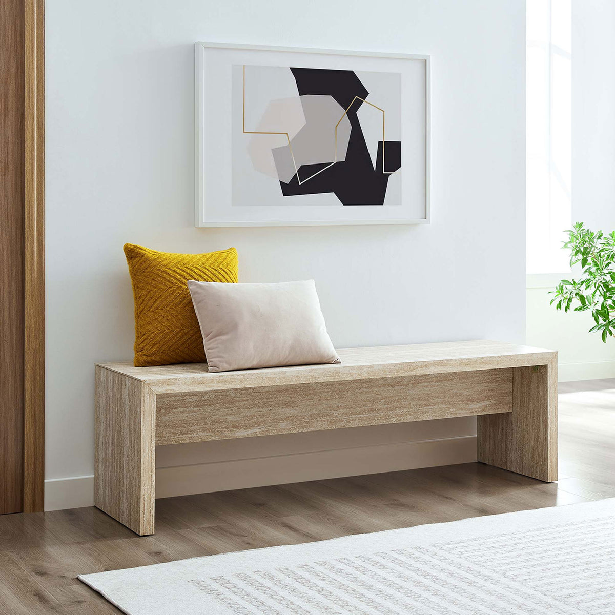 Modern bench brings warm neutral stone tones to living spaces with a slim, versatile profile || EEI-6773-TRA || front_angle_room