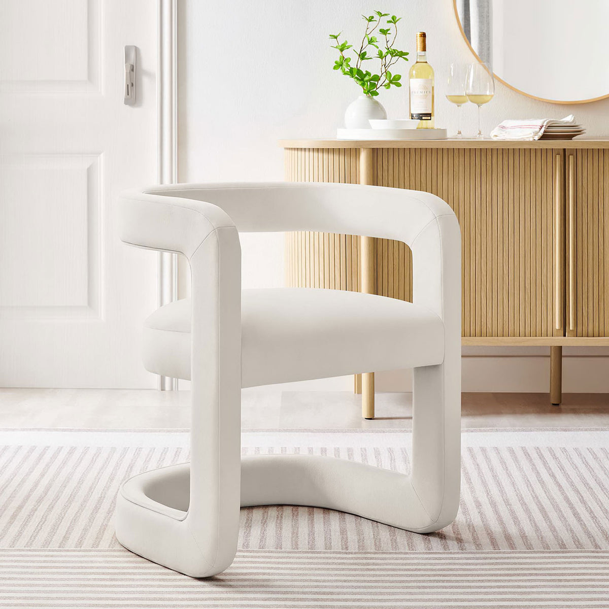 Alabaster velvet barrel chair elevates a modern dining nook or living area || EEI-6778-ALA || front_angle_room