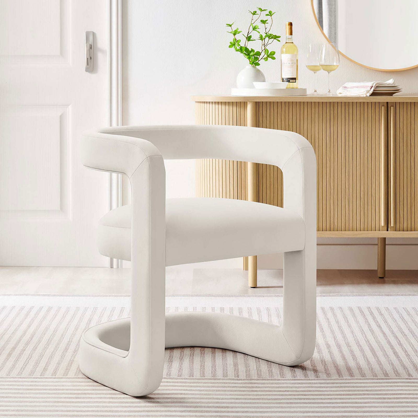 Alabaster velvet barrel chair elevates a modern dining nook or living area || EEI-6778-ALA || front_angle_room