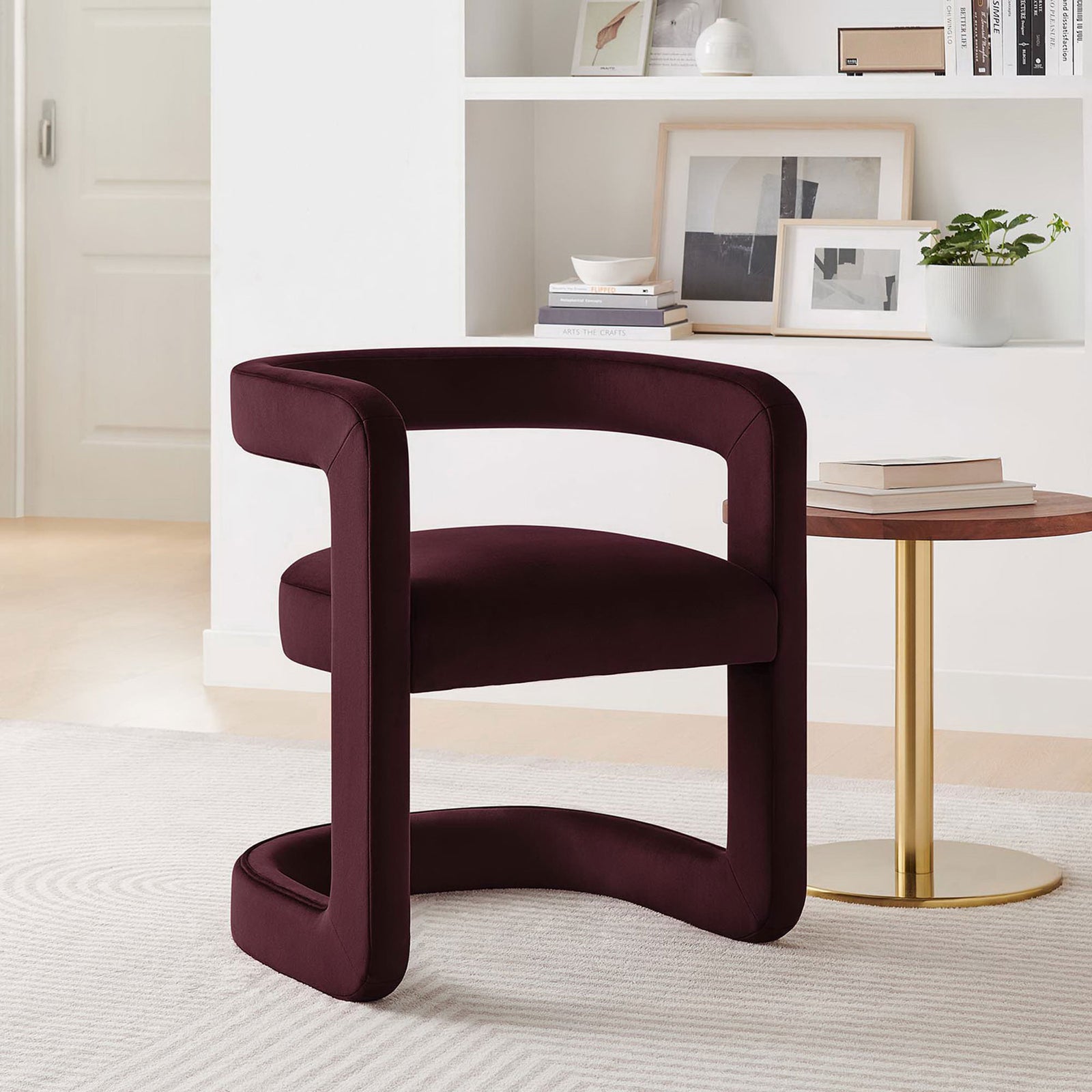 Versatile lounge chair pairs modern curvature with a supportive, contoured seat in mulberry velvet || EEI-6778-MUL || front_angle_room