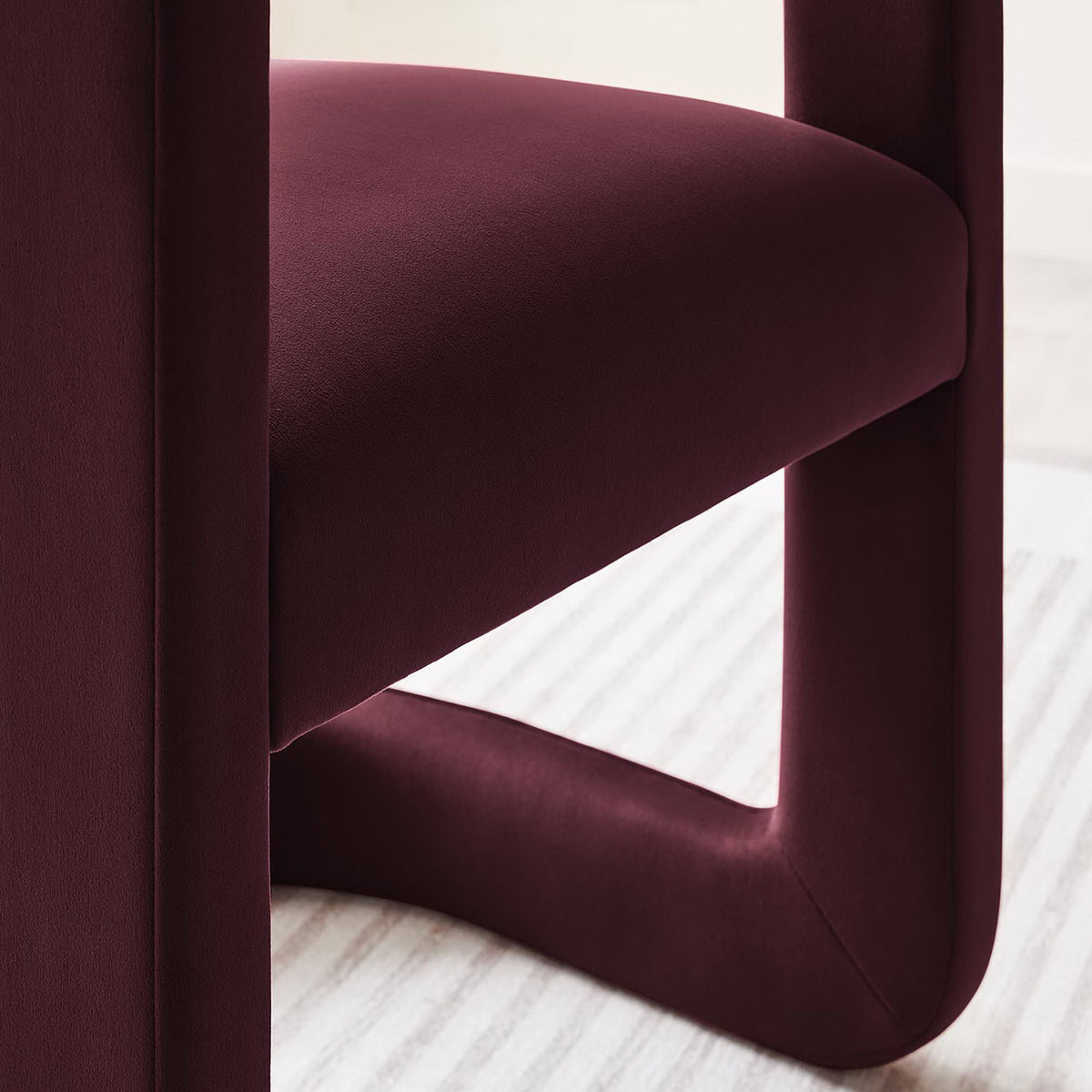 Soft velvet seat and sculpted base bring inviting texture and form to modern interiors || EEI-6778-MUL || detail_room
