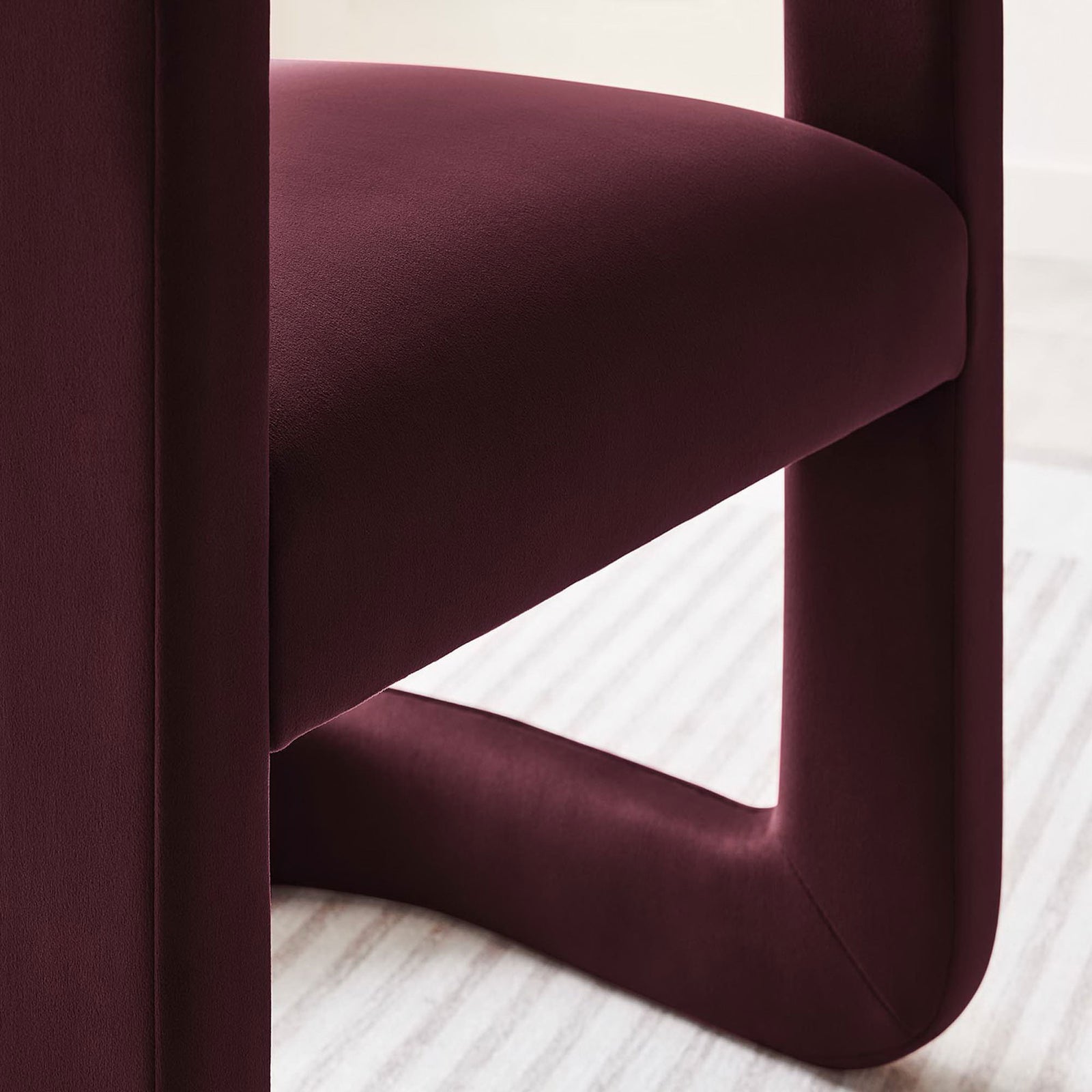 Soft velvet seat and sculpted base bring inviting texture and form to modern interiors || EEI-6778-MUL || detail_room