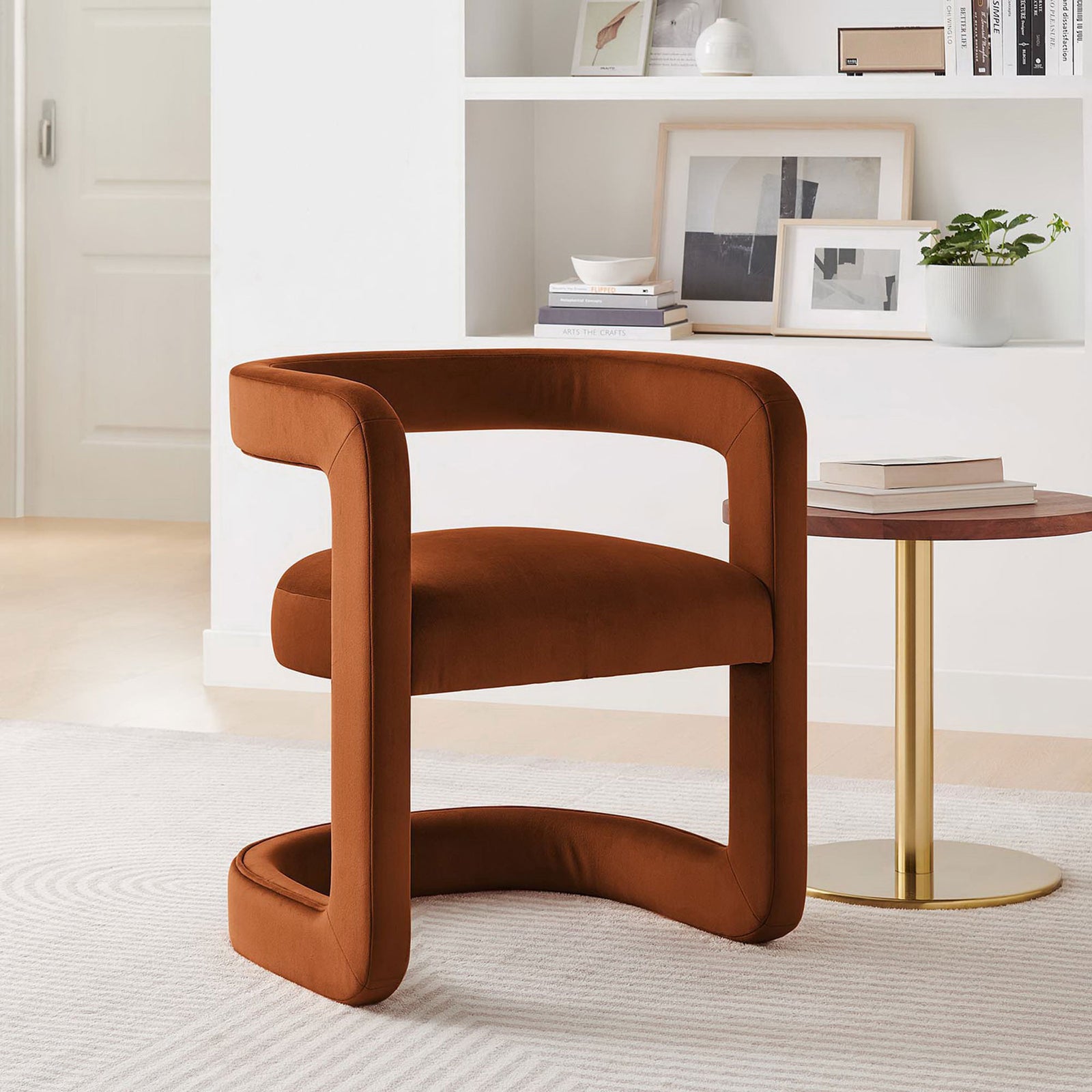 Versatile open-back chair elevates decor with curved lines and cozy performance velvet upholstery || EEI-6778-RUS || front_angle_room