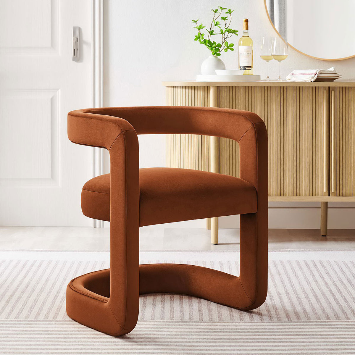 Rust velvet accent chair adds sculptural warmth and modern flair to the living room || EEI-6778-RUS || front_angle_room