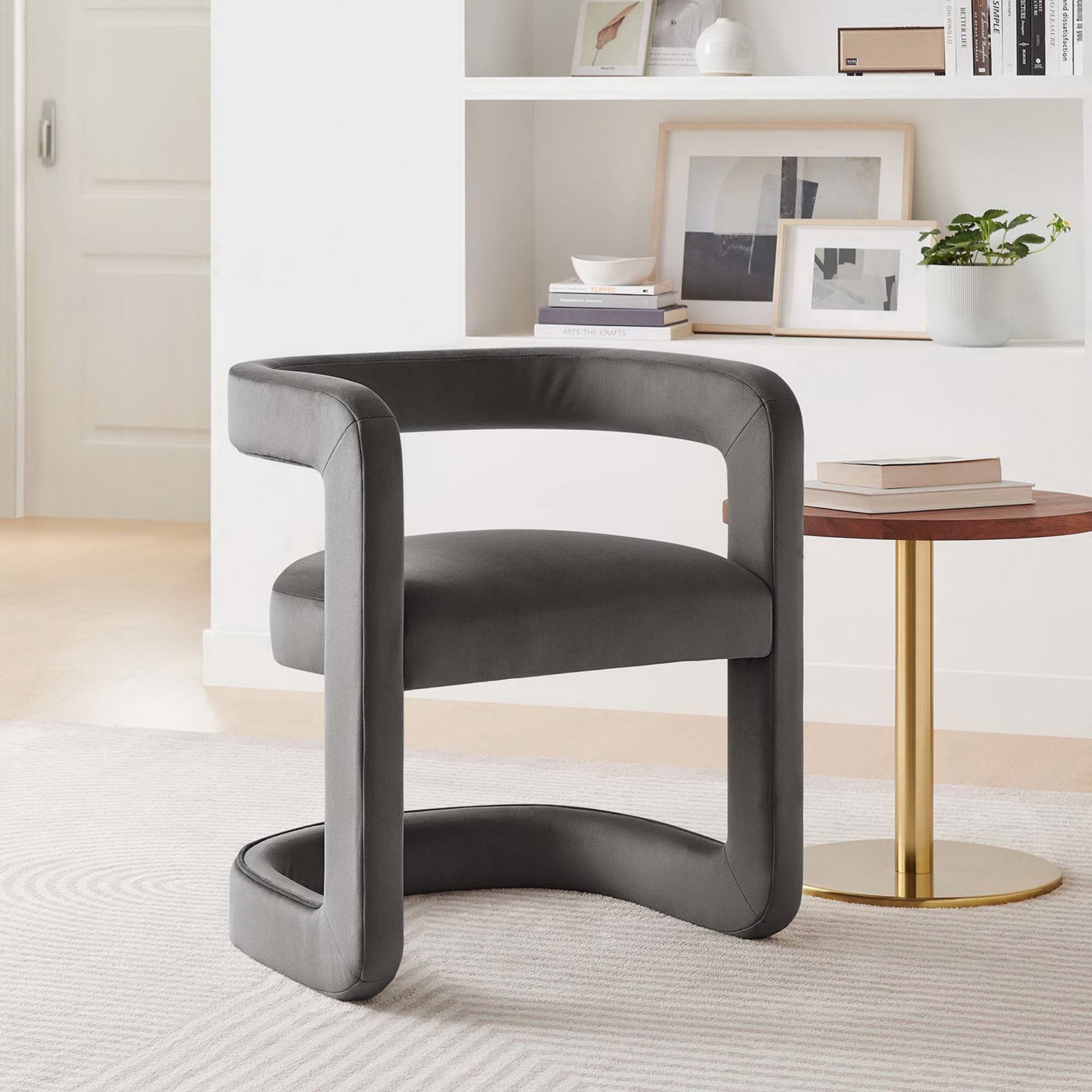 Storm gray velvet chair pairs effortlessly with contemporary decor and warm metallic accents || EEI-6778-STG || front_angle_room