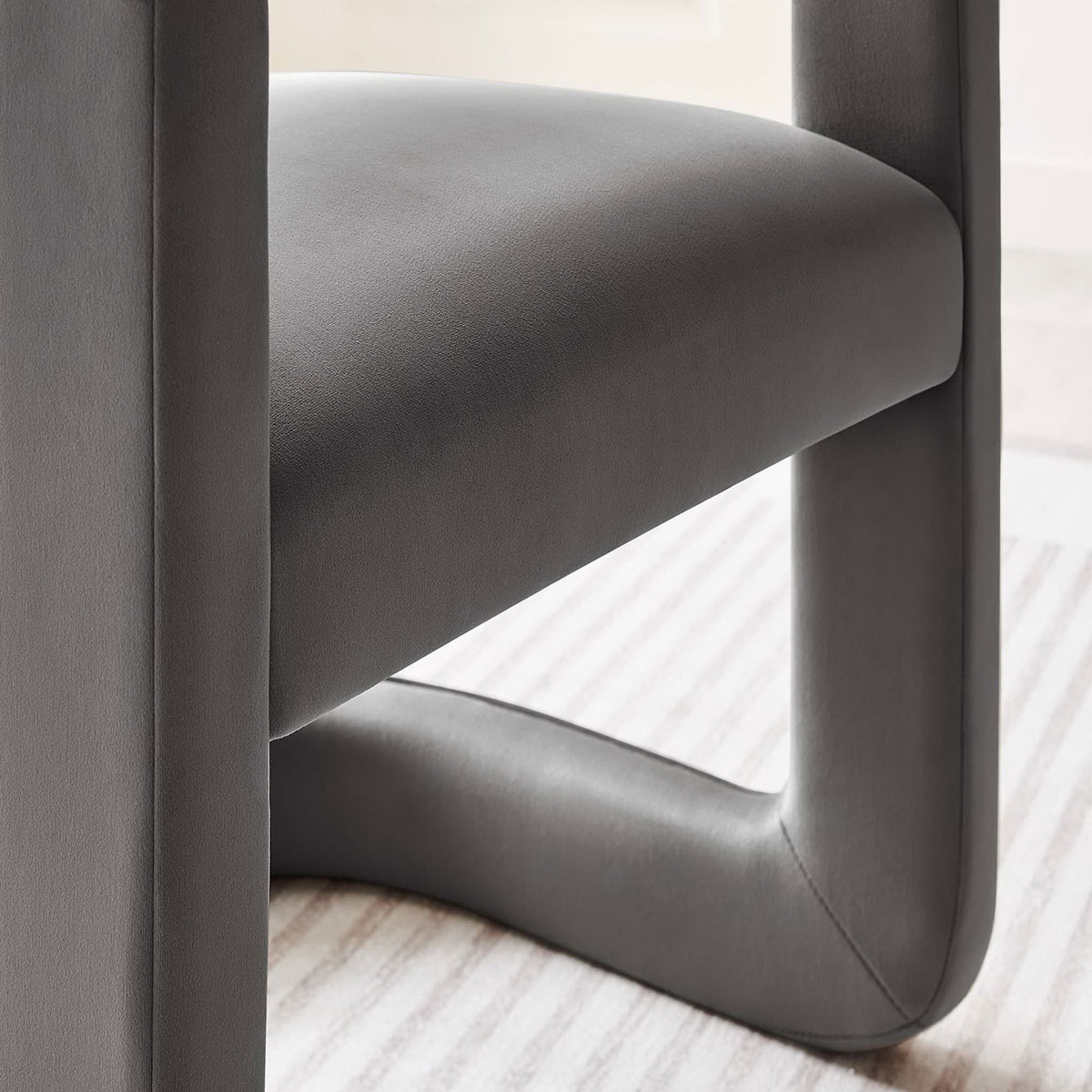 Soft performance velvet and rounded rails with crisp tailoring over dense foam cushioning || EEI-6778-STG || detail_room