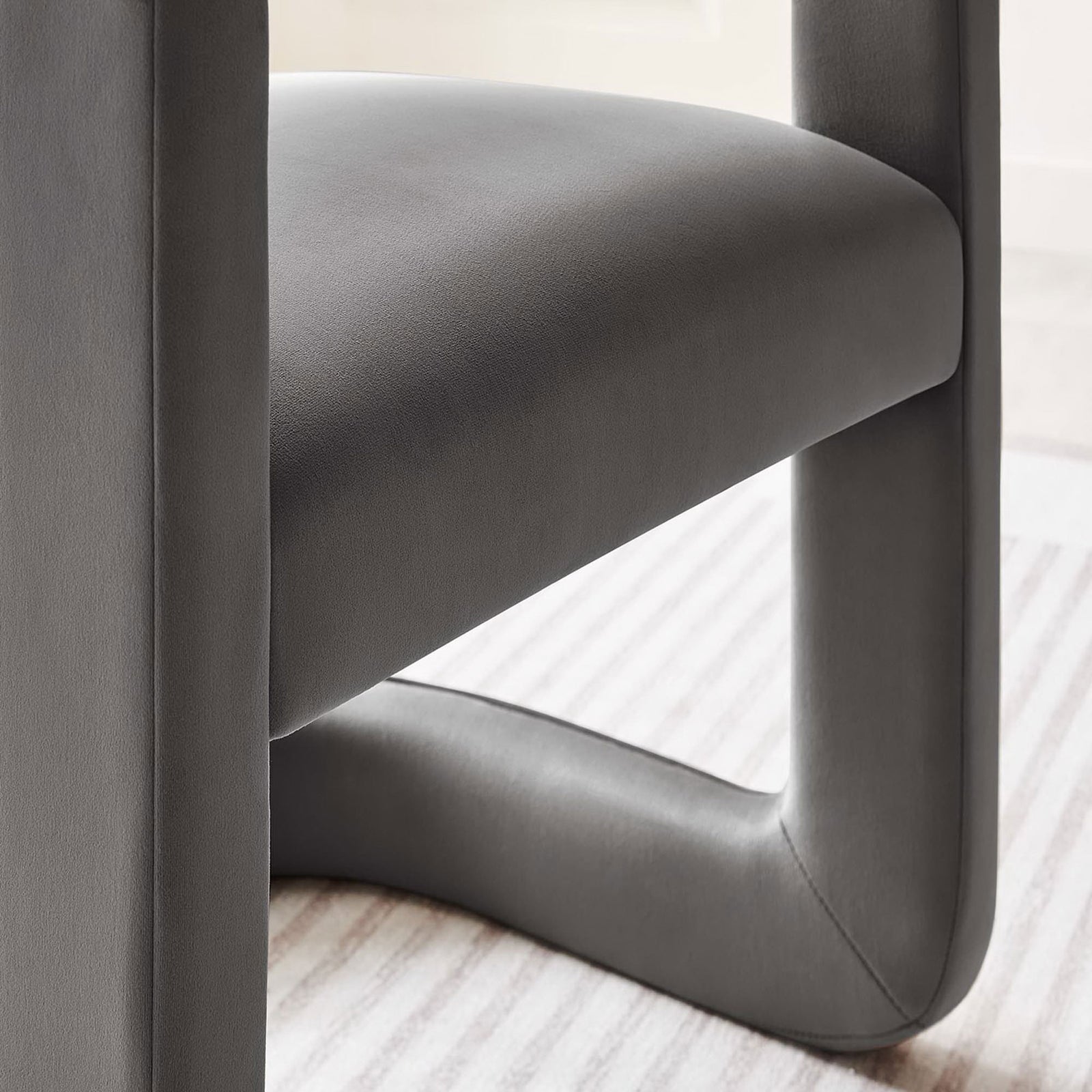 Soft performance velvet and rounded rails with crisp tailoring over dense foam cushioning || EEI-6778-STG || detail_room