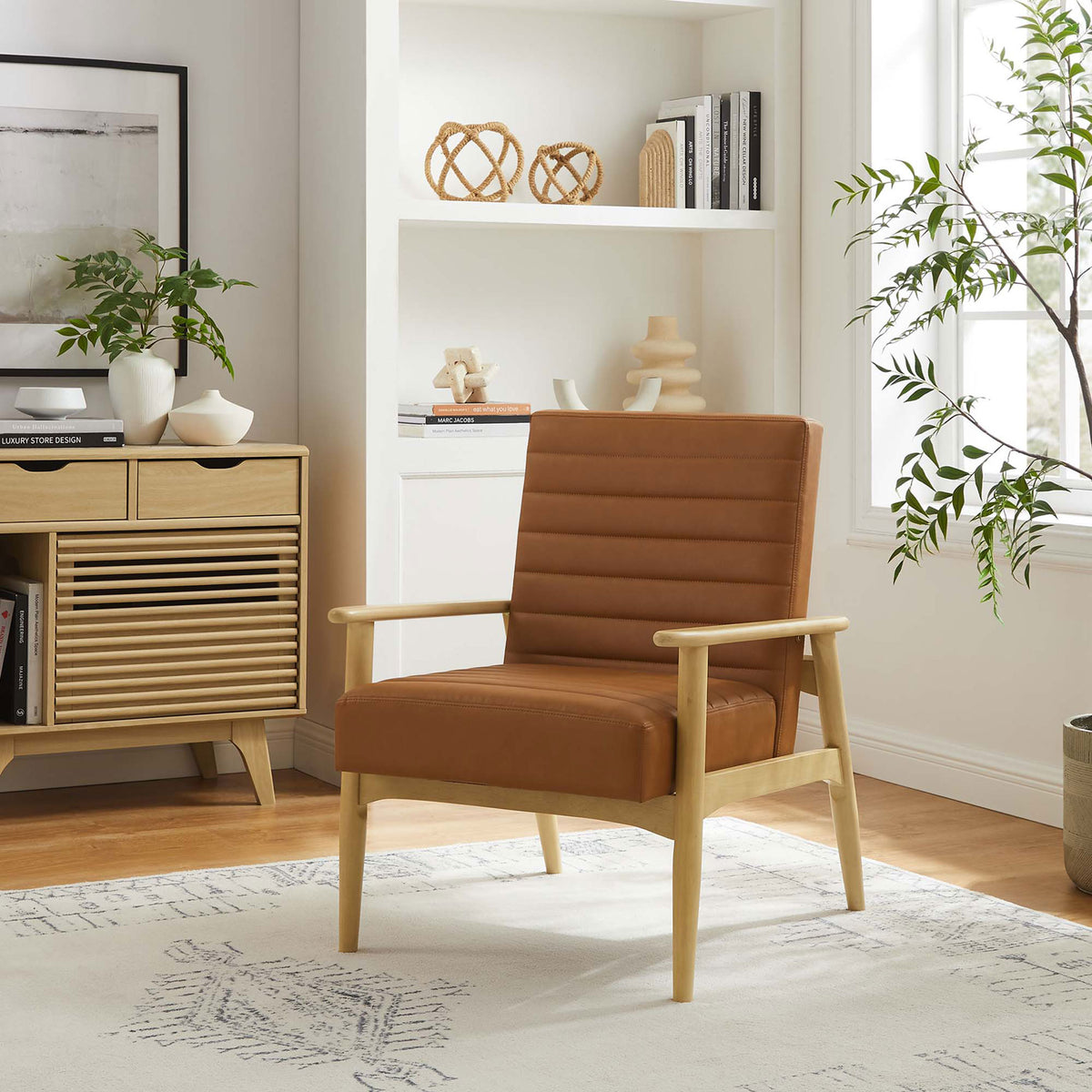 Mid-century lounge chair pairs tan vegan leather with a natural wood frame for timeless style || EEI-6779-NAT-TAN || front_angle_room
