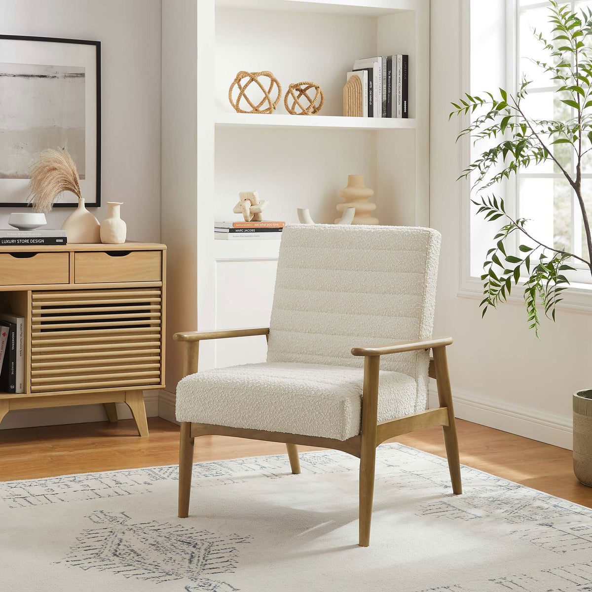 Modern lounge chair in ivory boucle brings warmth and texture to a clean living room || EEI-6780-FRO-IVO || front_angle_room