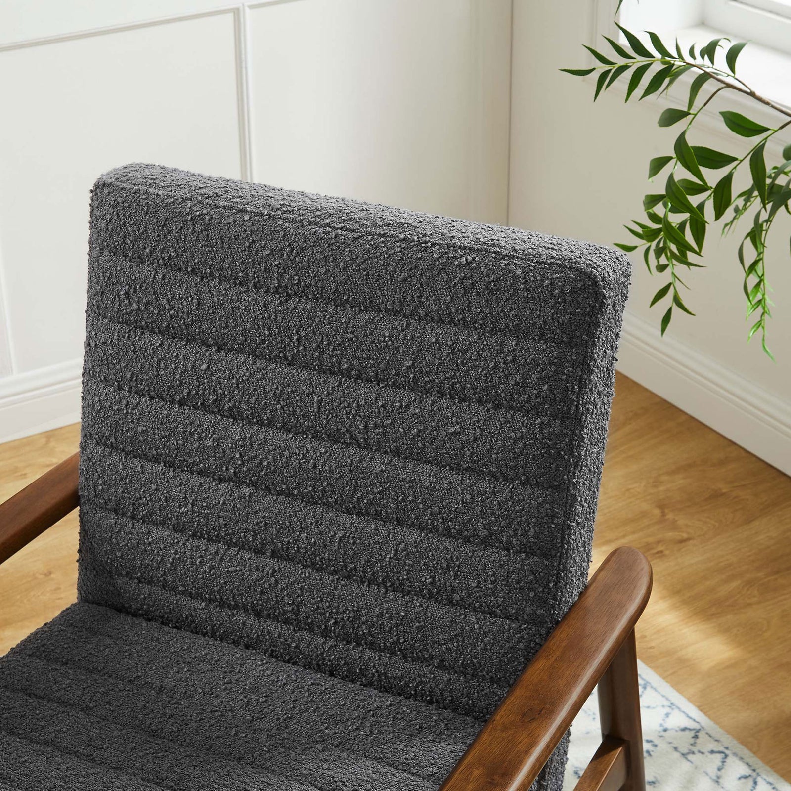 Boucle in deep charcoal pairs beautifully with the warm walnut finish. || EEI-6780-WAL-CHA || detail_room