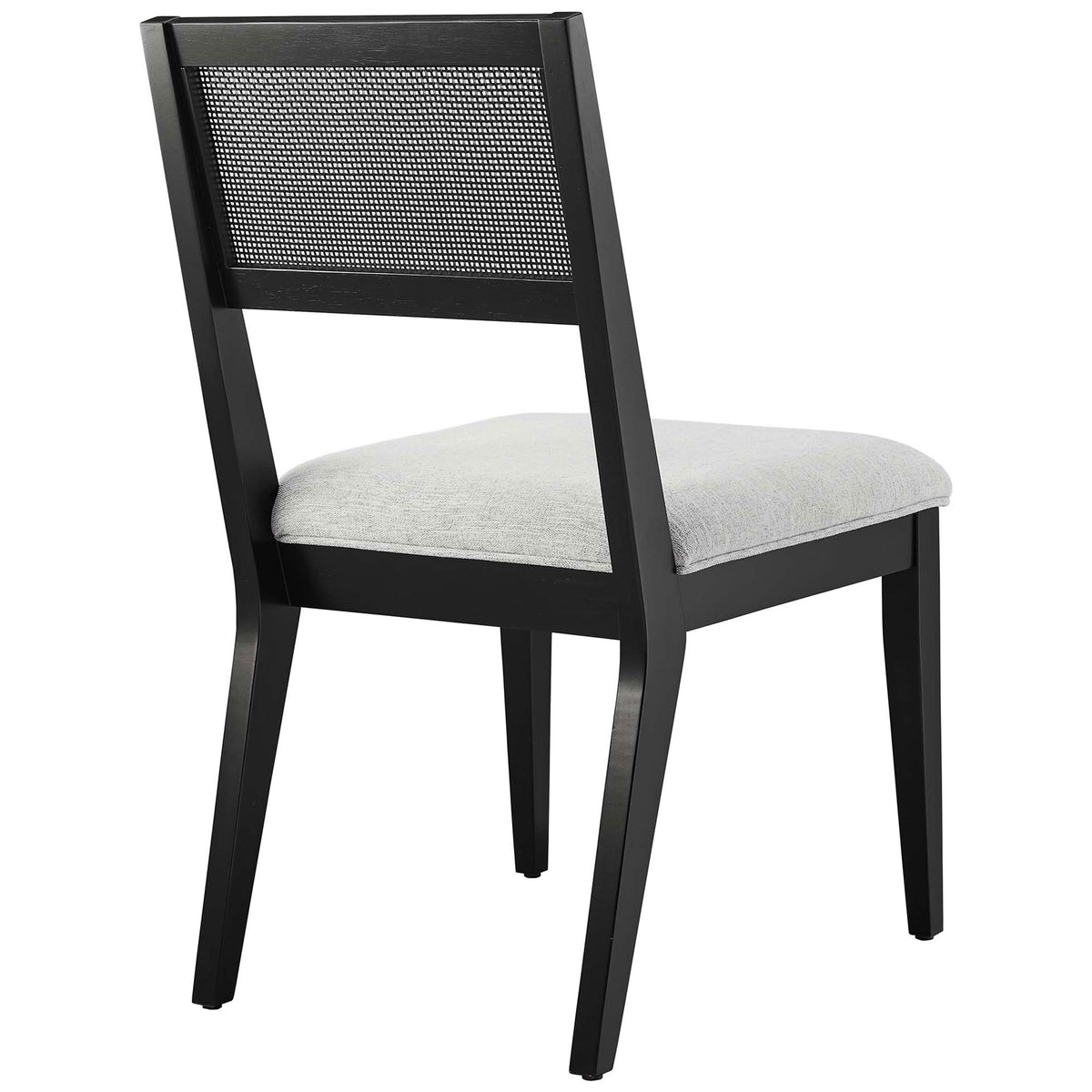 Open cane backrest framed in black wood adds airy texture and support to this versatile dining chair design || EEI-6781-BLK-HLG || back_angle_studio