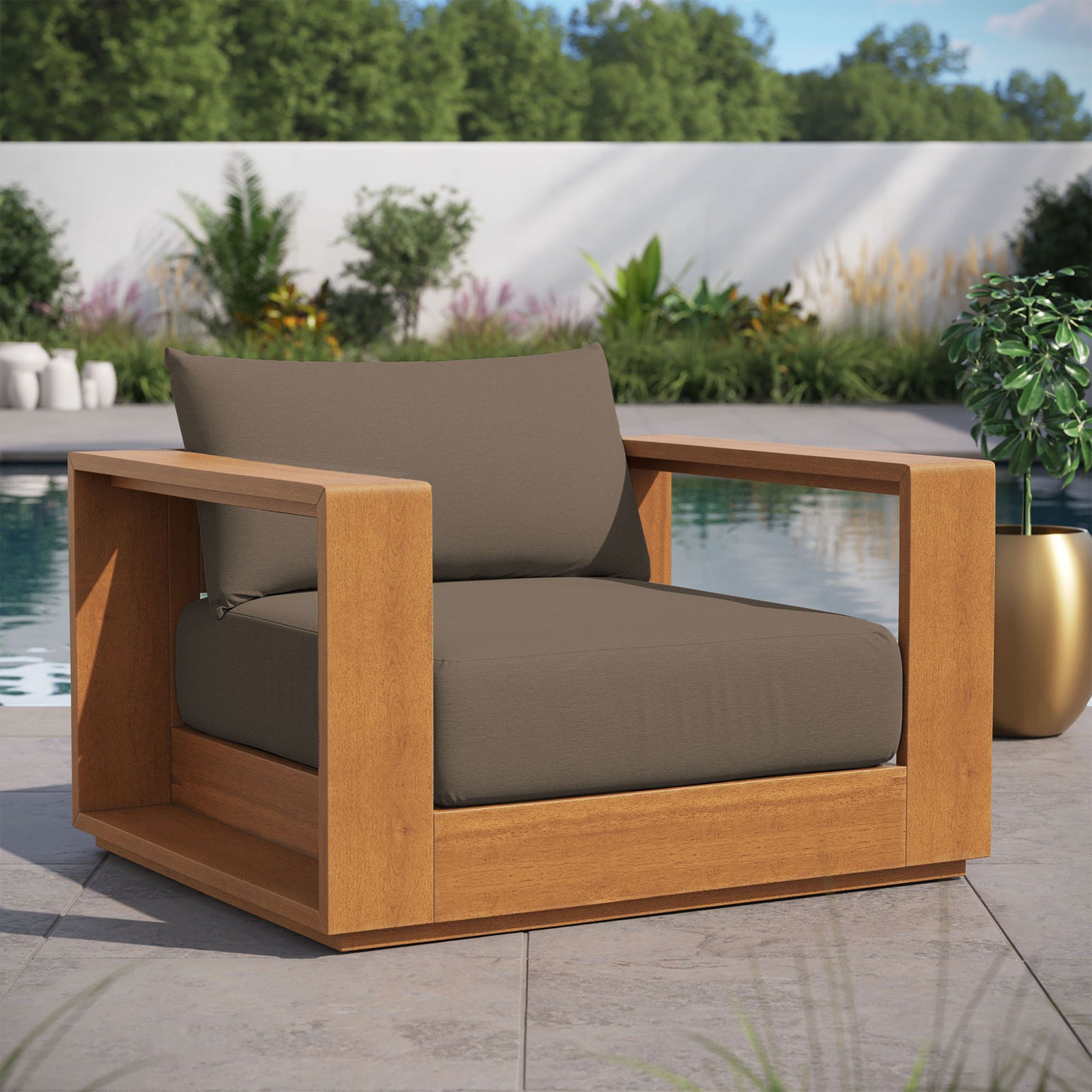 Tahoe acacia outdoor lounge chair with cocoa cushions styled on a modern poolside patio || EEI-6782-NAT-COA || front_angle_room