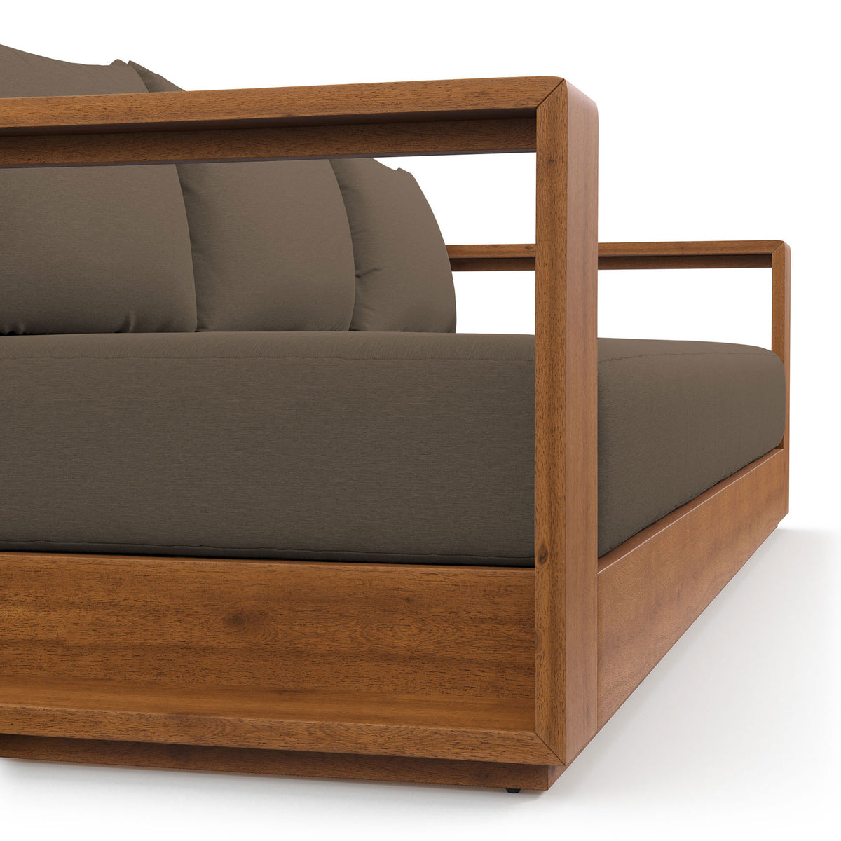 Close view of the Tahoe sofa arm, featuring smooth acacia wood and tailored cocoa upholstery. || EEI-6784-NAT-COA || detail_studio